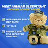 Distorted image with blue and yellow hues features Vitamin Sleep Night text, bed and pillow icons, checkmarks, and a personalized Air Force Teddy Bear from ZZZ BEARS—a thoughtful gift for military kids—amid glitch effects and overlapping shapes.