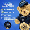 A close-up of two plush Coast Guard teddy bears in blue pajamas, surrounded by checklist text and marked checkboxes on a blue background—a cute Coast Guard kids gift by ZZZ BEARS with a “Bedtime” label at the bottom.