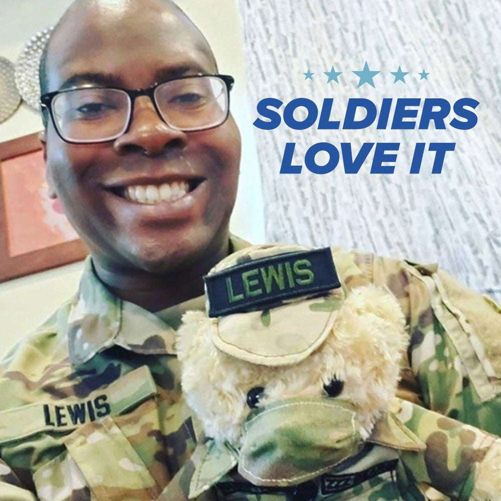 Glitched image of a smiling person in uniform with text: SOLDIERS LOVE IT—like the ZZZ BEARS Sgt. Sleeptight Army Teddy Bear, a unique kids' sleep aid with storybook & sleep system.